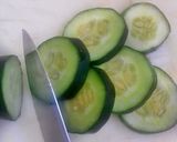 A picture of step 1 of Lime Cucumber Ginger Water.