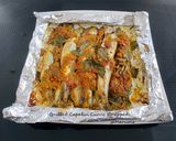 A picture of step 3 of Grilled Capelin Curry Wrapped.