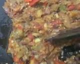 A picture of step 8 of Baingan ka bharta (with roasting method).