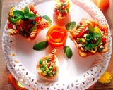 A picture of step 6 of Crispy Edible Diyas filled with Pasta Chat.