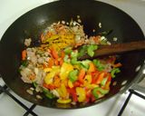 A picture of step 2 of Scrambled Eggs with Bell Peppers.