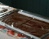 A picture of step 8 of Tiramisu, and Cocoa Sponge with plenty of Coffee Syrup.
