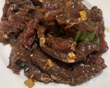 A picture of step 1 of Marinated Beef with Bell Peppers and Cherry Tomatoes.