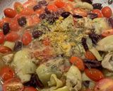 A picture of step 5 of Chicken with Artichokes, Tomatoes, Garlic, and Olives.