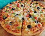 A picture of step 6 of Chicken Tikka Pizza 🍕🍕.