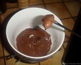 A picture of step 11 of Orange peels- dates and raisins chocolate candy.