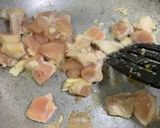A picture of step 4 of Almonds and cashew nut chicken.