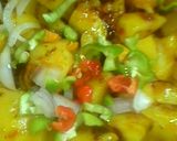 A picture of step 3 of My potatoes an egg sauce.