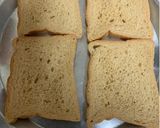 A picture of step 2 of Chilli Cheese Toast on tawa.