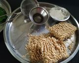 A picture of step 1 of Noodle Burger with Aloo Tikki.