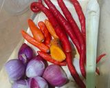 Foto langkah ke 2 dari resep Tumis bunga pepaya.