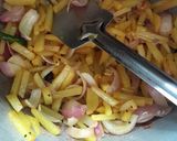 A picture of step 2 of Potato onion fry.