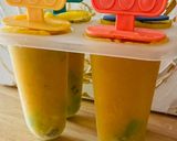 A picture of step 2 of Mango Banana Kiwi Popsicle.