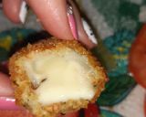 Foto del paso 4 de la receta: Aros de cebollas rellenos de queso