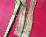 A picture of step 1 of Courgette noodles,on pesto with mushrooms-Fried eggs.