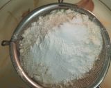 A picture of step 1 of Basbousa soaked in Orange & Honey syrup.