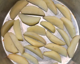 A picture of step 5 of Baked Spiced potato wedges with garlic Bechamel sauce.