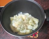 Foto del paso 13 de la receta Chuletas de cerdo adobadas con puré de papas, guisantes y salsa