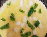 A picture of step 2 of My Nice Omelette for Lunch today. 😁.