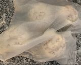 A picture of step 6 of Pan fried pork bun.