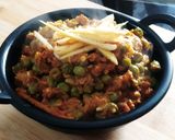 A picture of step 11 of Matar mushroom bharta.
