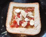 A picture of step 4 of Cheese Tomato Egg Toast.