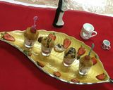 A picture of step 5 of Vermicelli PASTA bombs served with Strawberry custard sauce.