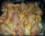 Foto del paso 4 de la receta Horneado de jamoncitos de pollo con patatas a la naranja