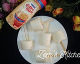 A picture of step 4 of Coffee Creamer Popsicles.