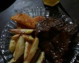 Foto del paso 4 de la receta: Bondiola a la mostaza y miel con papas y zapallo al horno