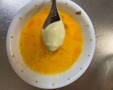 A picture of step 3 of Omu Sandwich (Sandwich wrapped with egg fry).