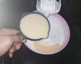 A picture of step 2 of Oreo vanilla ice cream with caramel sauce.