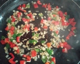 Foto del paso 5 de la receta: Arroz negro con calamar