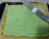 A picture of step 10 of Kiwi swiss roll cake.