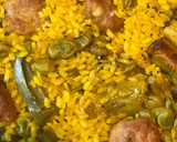 Foto del paso 11 de la receta: Arroz en paella de costillas con alcachofas y habitas