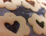 A picture of step 7 of Edible Christmas tree décor; stained glass windows biscuits.