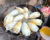 Foto del paso 9 de la receta: Calamares rellenos en salsa de mariscos a la crema