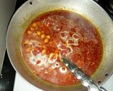 A picture of step 4 of Chole or cheakpea curry.