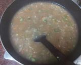 A picture of step 1 of Eggs and veggies corn soup.