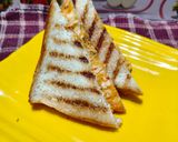 A picture of step 6 of Easy peasy cheesy sandwich.