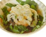A picture of step 3 of Hummus stuffed chessey mushrooms.