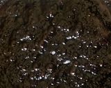 A picture of step 2 of No bake Chocolate biscuit cake.