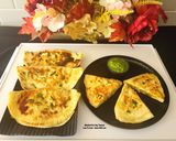 A picture of step 5 of Bolani - Afghani Breakfast - Flatbread Stuffed With Potatoes, Spring Onions, Cilantro And Spices.
