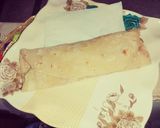 A picture of step 6 of Cheesy chicken tikka paratha roll.