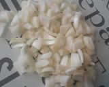 A picture of step 1 of Apple and pear chicken tikka stir fry with rice.