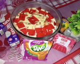 A picture of step 10 of Mango tropical fruits trifle.