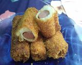 Foto langkah ke 6 dari resep Roti Tawar Gulung isi Sosis Keju.