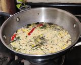 A picture of step 9 of Corn daliya upma.