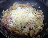 Foto del paso 4 de la receta: Alcachofas al queso con jamón