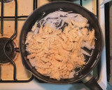 Foto del paso 7 de la receta: Tostadas de Tinga de Pollo